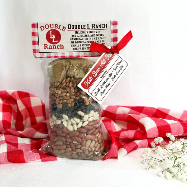 Double L Ranch Multi-Bean Chili Mix bag displayed with flowers and tablecloth