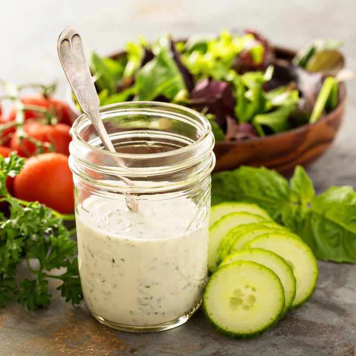 Chef Jannybug Garlic Ranch Dip Mix prepared and served in mason jar with vegetables