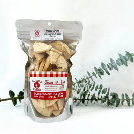 Front view of Double L Ranch Freeze-Dried Cinnamon Sugar Apples Bag with foliage