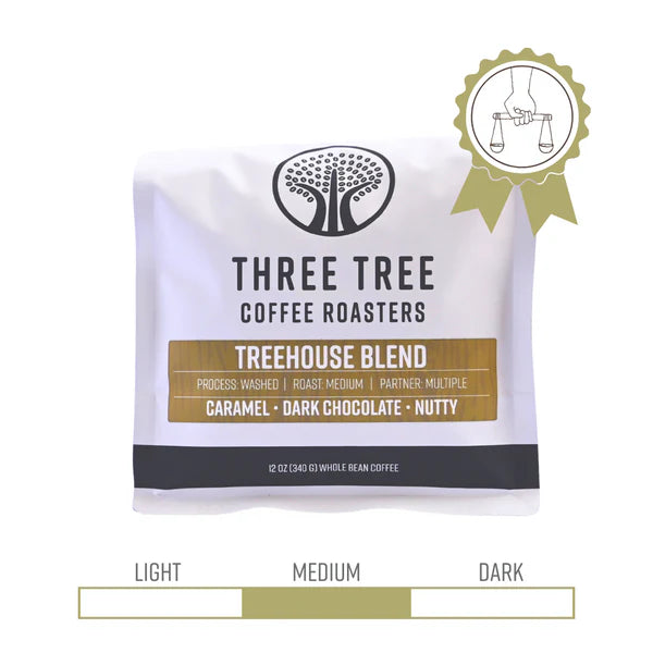 Three Tree Coffee Roaster Treehouse Blend 12 ounce bag with fair trade seal.